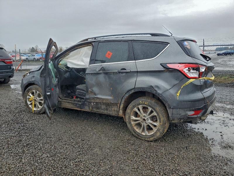 Photo 2 from auction – 2018 FORD ESCAPE SE with VIN 1FMCU9GD7JUA12327