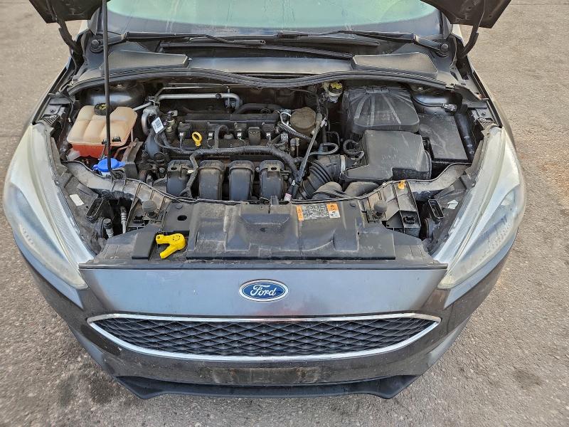 Photo 11 from auction – 2015 FORD FOCUS SE with VIN 1FADP3K29FL369210