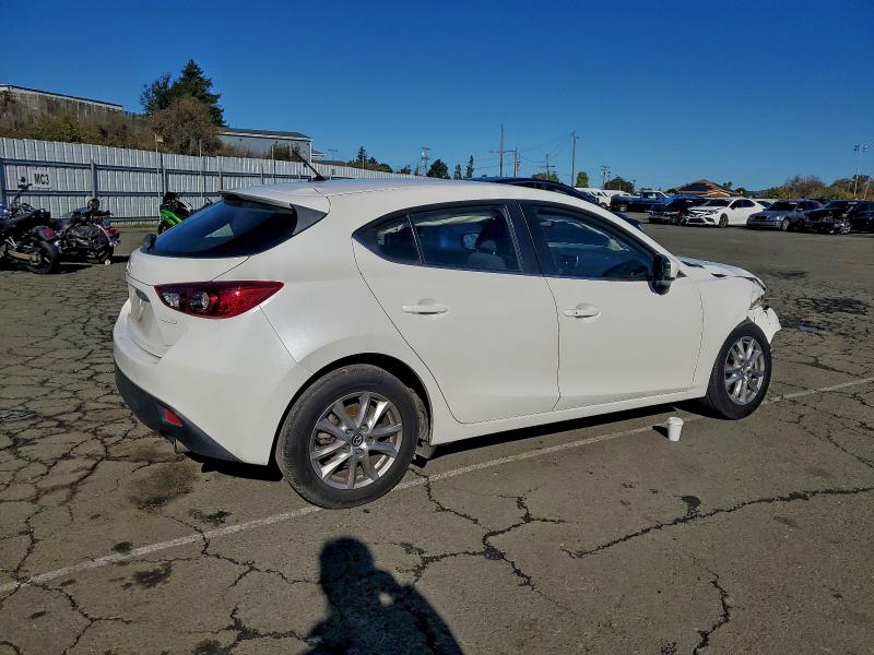 Photo 3 from auction – 2014 MAZDA 3 TOURING with VIN JM1BM1L75E1162879