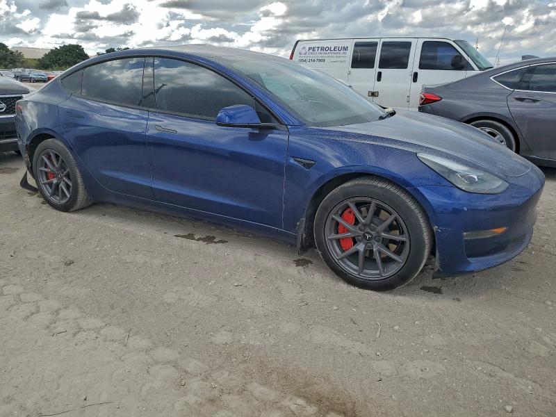 Photo 4 from auction – 2022 TESLA MODEL 3 with VIN 5YJ3E1EB5NF104927