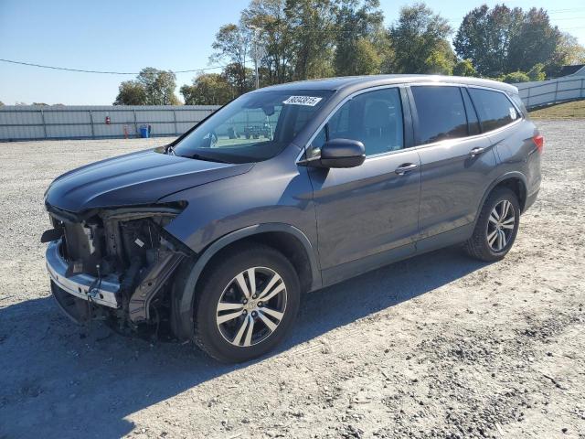 HONDA PILOT EXL 2018 with VIN 5FNYF6H63JB034157 - Photo from auction