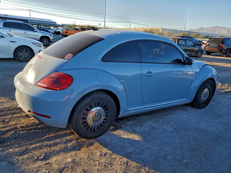 Photo 3 from auction – 2014 VOLKSWAGEN BEETLE with VIN 3VWJP7AT8EM619240
