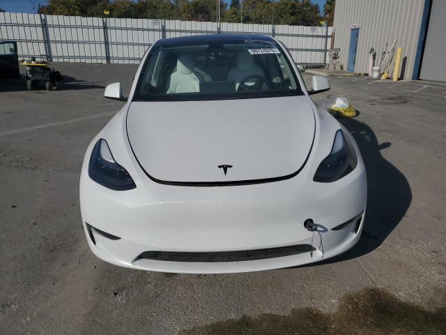 Photo 5 from auction – 2023 TESLA MODEL Y with VIN 7SAYGAEE6PF861688