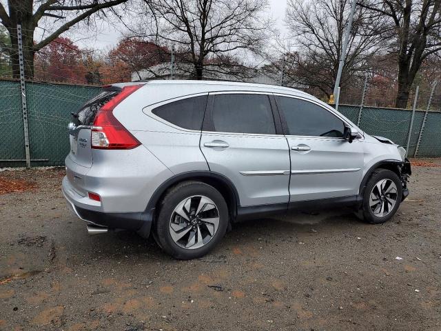 Photo 3 from auction – 2016 HONDA CR-V TOURI with VIN 5J6RM4H91GL074438