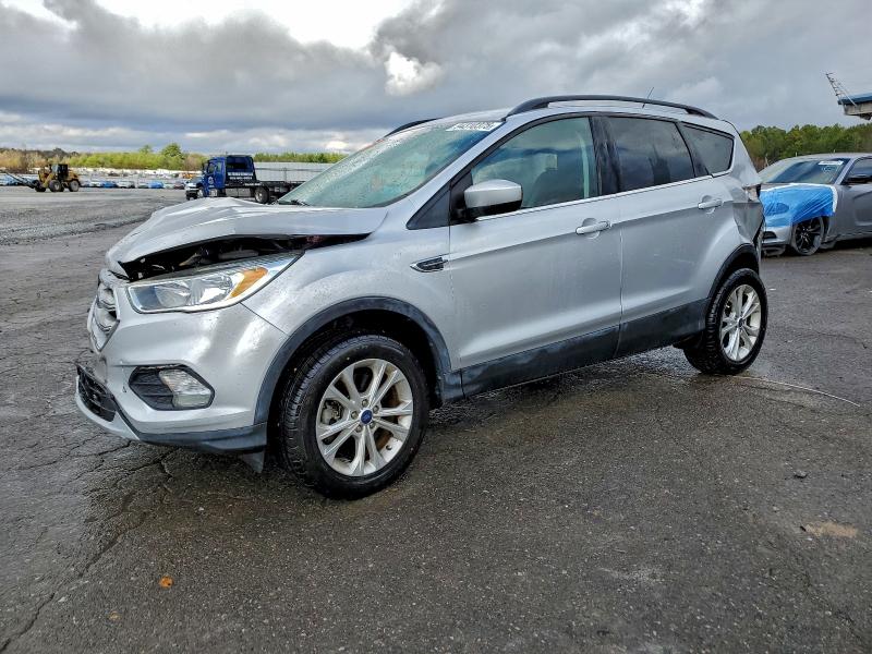 FORD ESCAPE SE 2018 with VIN 1FMCU0G97JUB49565 - Photo from auction