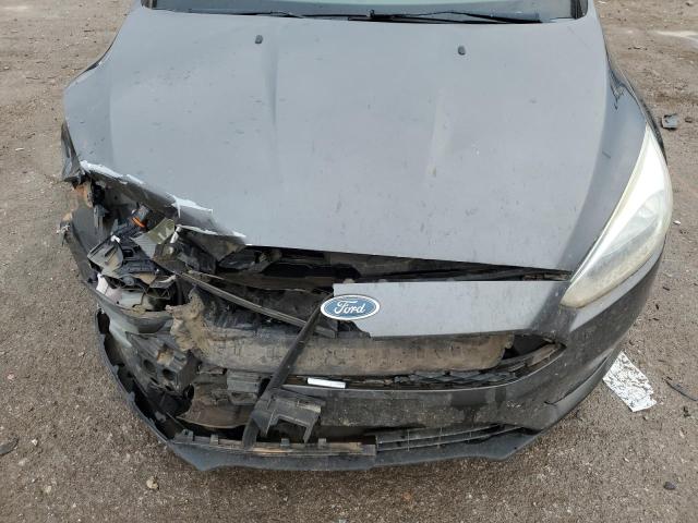 Photo 11 from auction – 2017 FORD FOCUS SE with VIN 1FADP3FE4HL254201