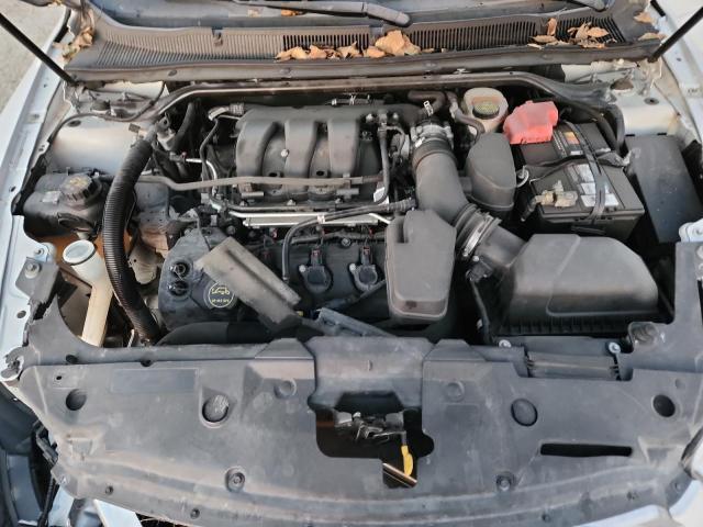 Photo 11 from auction – 2015 FORD TAURUS POL with VIN 1FAHP2MK3FG138983