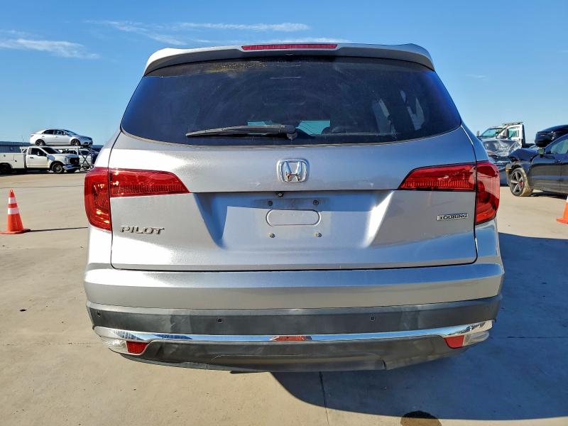 Photo 6 from auction – 2018 HONDA PILOT TOUR with VIN 5FNYF5H93JB020456