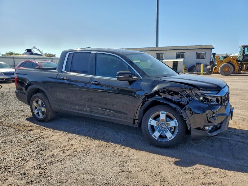 Photo 4 from auction – 2025 HONDA RIDGELINE with VIN 5FPYK3F55SB029684