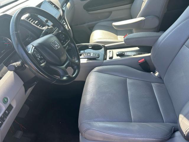 Photo 13 from auction – 2020 HONDA PILOT ELIT with VIN 5FNYF6H05LB026947