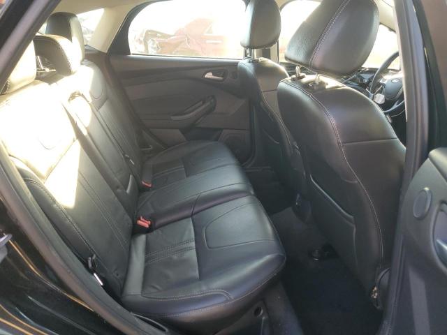 Photo 10 from auction – 2014 FORD FOCUS TITA with VIN 1FADP3N22EL192302