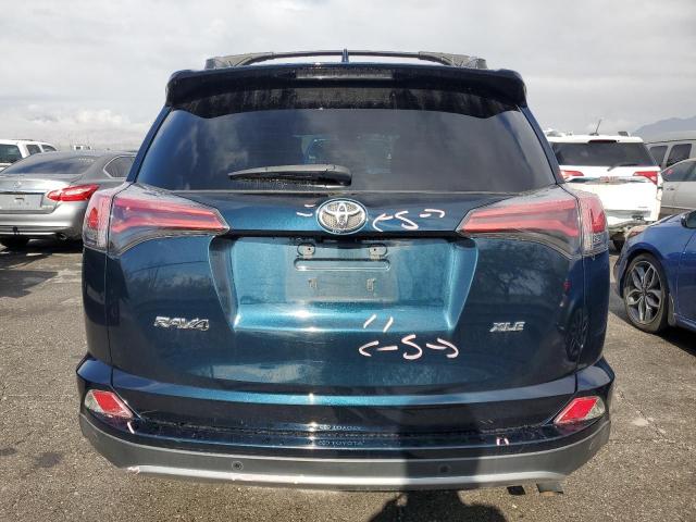 Photo 6 from auction – 2017 TOYOTA RAV4 XLE with VIN 2T3WFREV4HW387855