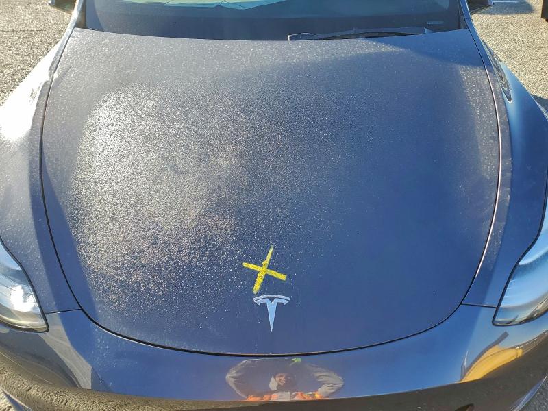Photo 11 from auction – 2021 TESLA MODEL Y with VIN 5YJYGAEE2MF199777