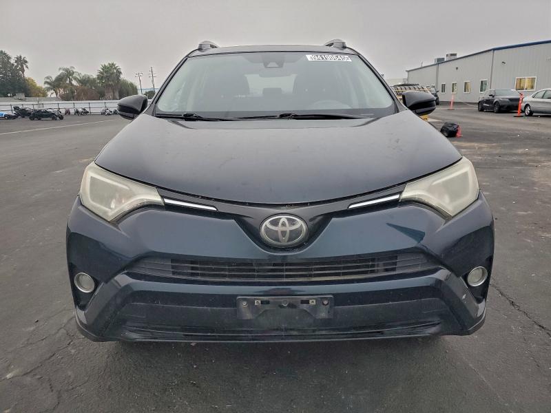 Photo 5 from auction – 2017 TOYOTA RAV4 LE with VIN 2T3ZFREV8HW341023