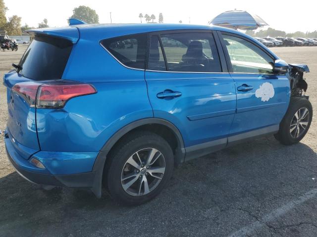Photo 3 from auction – 2017 TOYOTA RAV4 XLE with VIN JTMWFREV9HJ143522