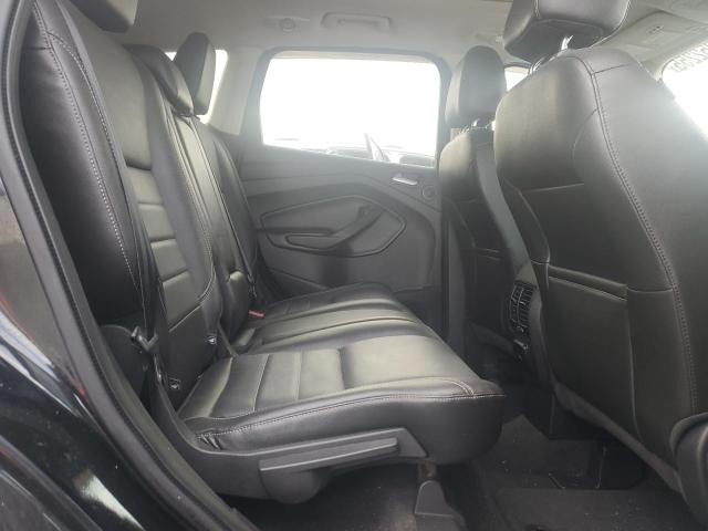 Photo 11 from auction – 2014 FORD ESCAPE TIT with VIN 1FMCU9J99EUD89090