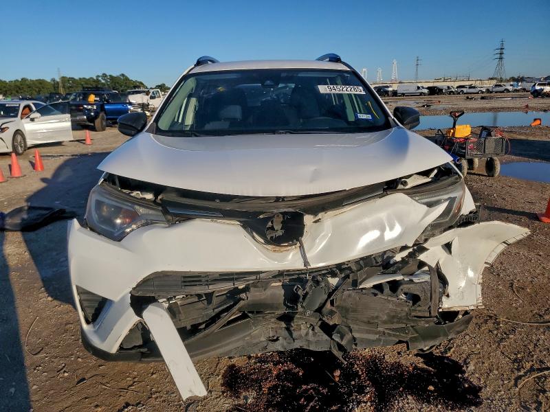 Photo 5 from auction – 2018 TOYOTA RAV4 LE with VIN JTMZFREV2JJ190846