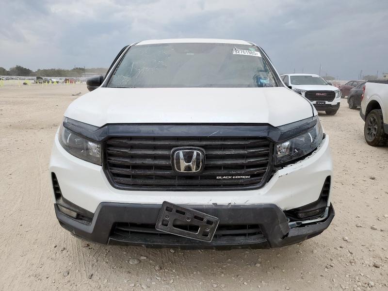 Photo 5 from auction – 2023 HONDA RIDGELINE with VIN 5FPYK3F89PB034615