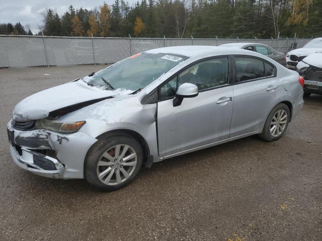 HONDA CIVIC EXL 2012 with VIN 2HGFB2F99CH113615 - Photo from auction