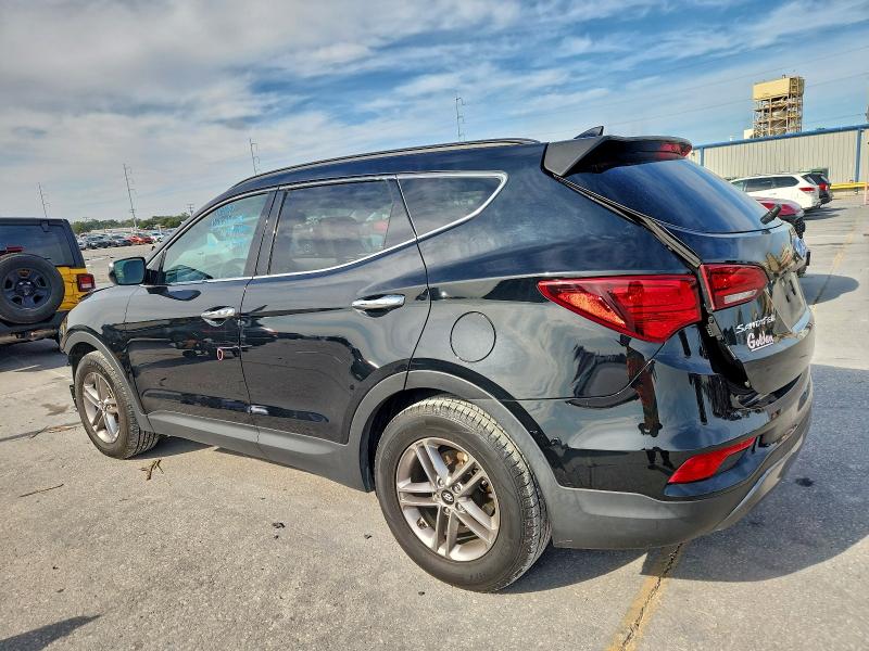 Photo 2 from auction – 2017 HYUNDAI SANTA FE S with VIN 5NMZU3LB5HH027104