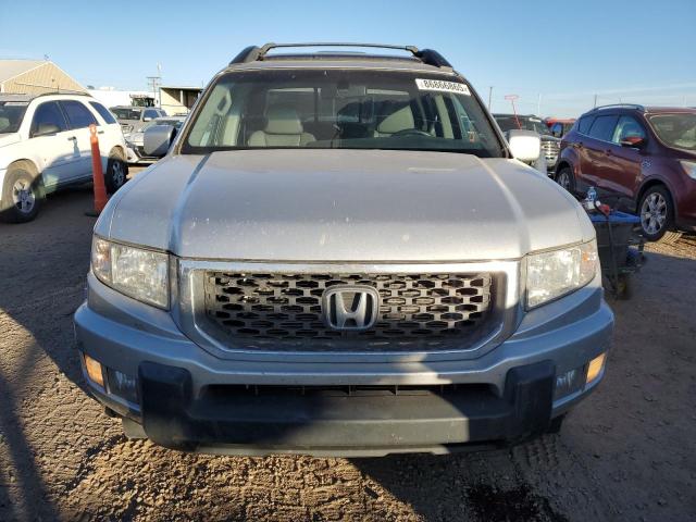 Photo 5 from auction – 2012 HONDA RIDGELINE with VIN 5FPYK1F51CB454406