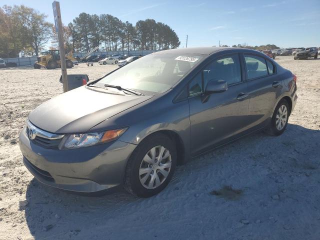 HONDA CIVIC LX 2012 with VIN 2HGFB2F54CH577084 - Photo from auction