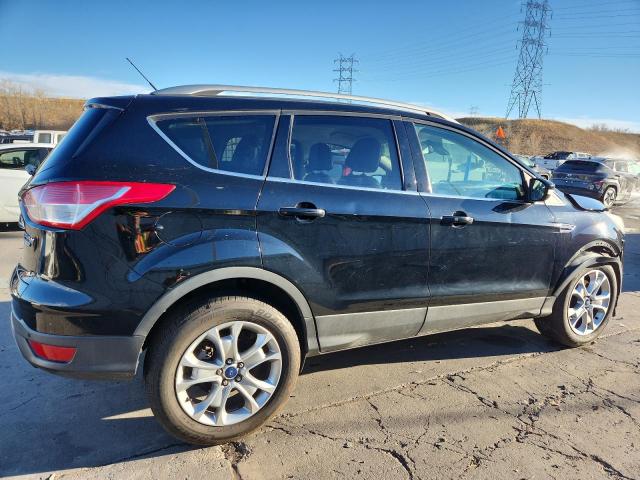 Photo 3 from auction – 2016 FORD ESCAPE TIT with VIN 1FMCU9J95GUC79351