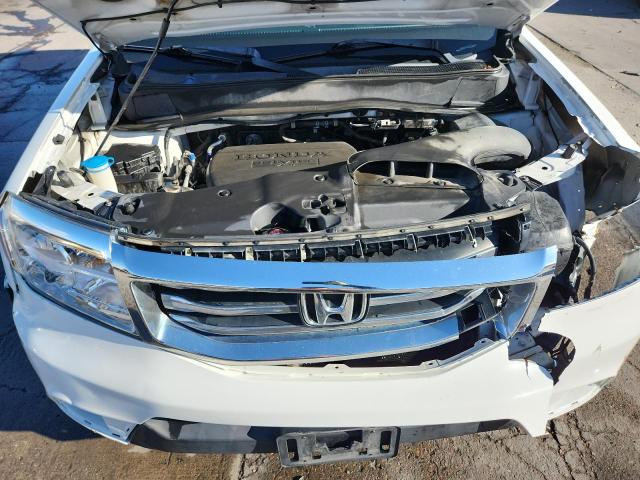 Photo 12 from auction – 2013 HONDA PILOT EXL with VIN 5FNYF4H54DB012345