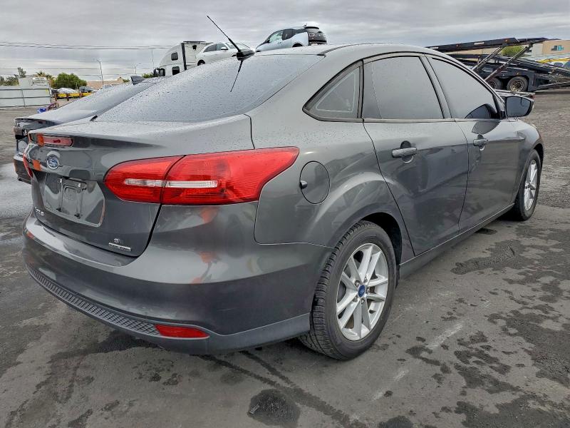 Photo 3 from auction – 2015 FORD FOCUS SE with VIN 1FADP3F21FL205363