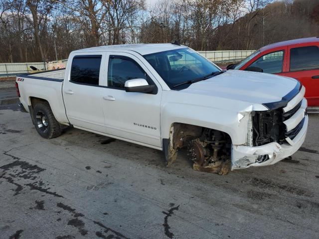 Photo 4 from auction – 2018 CHEVROLET SILVERADO with VIN 3GCUKREC6JG630010