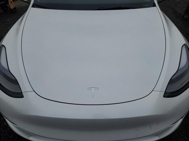 Photo 11 from auction – 2024 TESLA MODEL Y with VIN 7SAYGDEE0RA291088