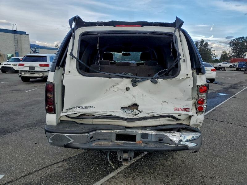 Photo 6 from auction – 2004 GMC YUKON with VIN 3GKEC16T24G304490