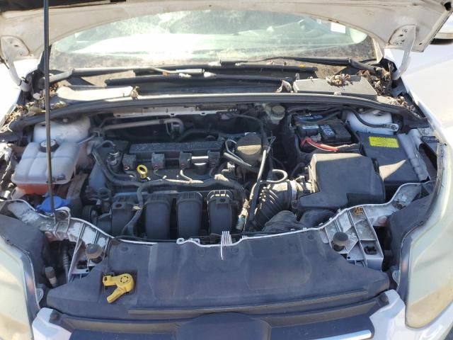 Photo 11 from auction – 2013 FORD FOCUS SE with VIN 1FADP3F2XDL309587