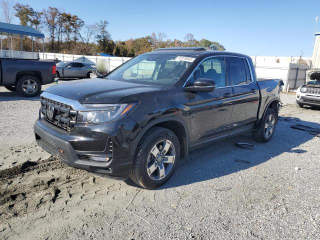 HONDA RIDGELINE 2025 with VIN 5FPYK3F51SB020867 - Photo from auction