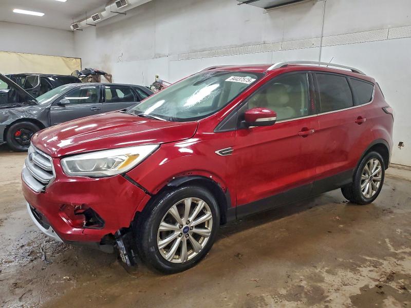 FORD ESCAPE TIT 2017 with VIN 1FMCU9JD4HUD09834 - Photo from auction