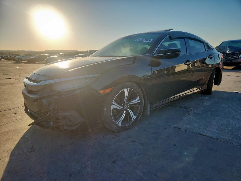 HONDA CIVIC TOUR 2017 with VIN 19XFC1F97HE019533 - Photo from auction