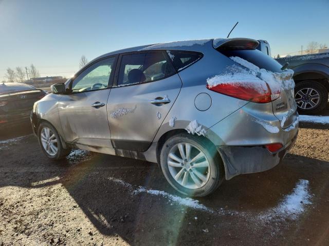 Photo 2 from auction – 2011 HYUNDAI TUCSON GLS with VIN KM8JUCACXBU190898
