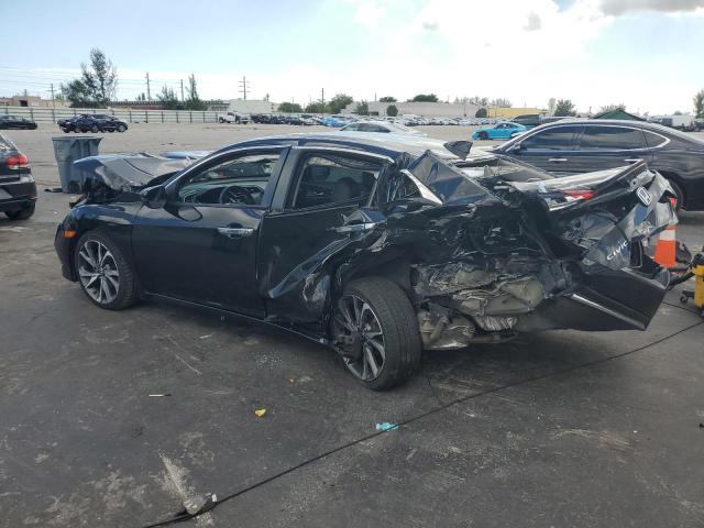 Photo 2 from auction – 2020 HONDA CIVIC with VIN 19XFC1F93LE202257