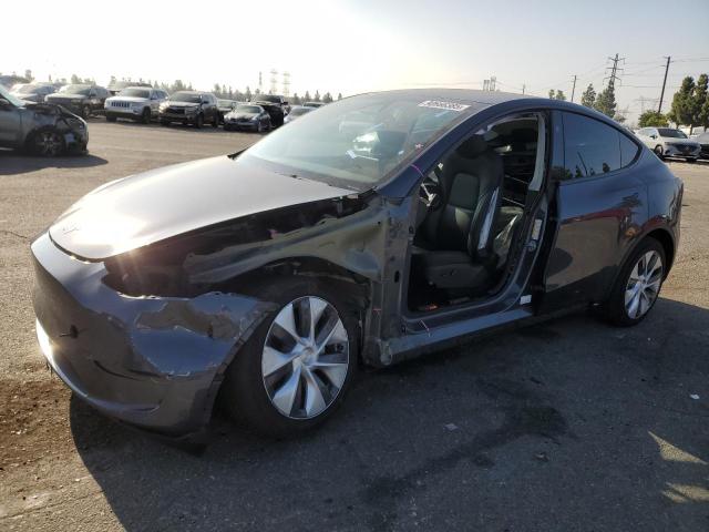 TESLA MODEL Y 2023 with VIN 7SAYGDEE3PA154045 - Photo from auction