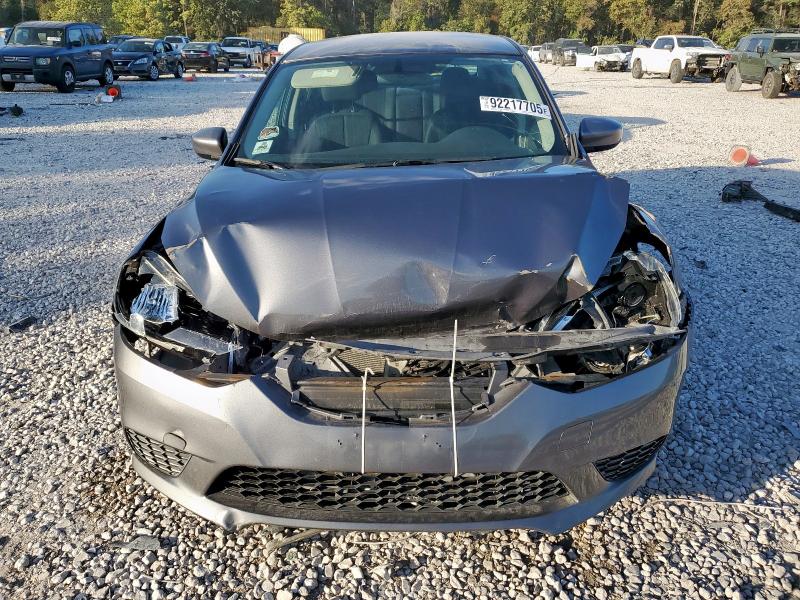 Photo 5 from auction – 2016 NISSAN SENTRA S with VIN 3N1AB7AP3GL642067