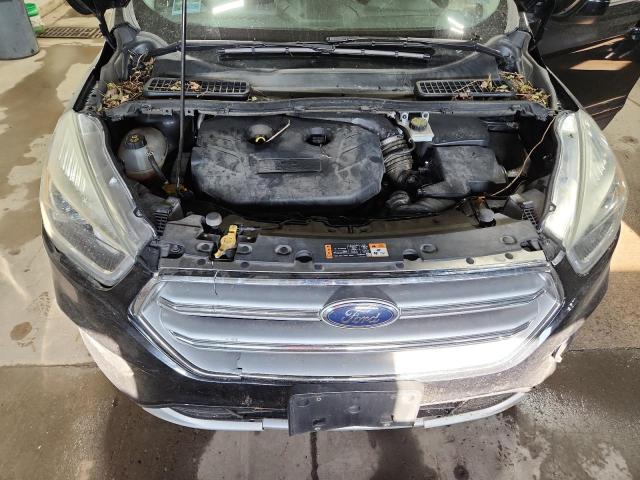 Photo 12 from auction – 2017 FORD ESCAPE SE with VIN 1FMCU9G99HUE35903