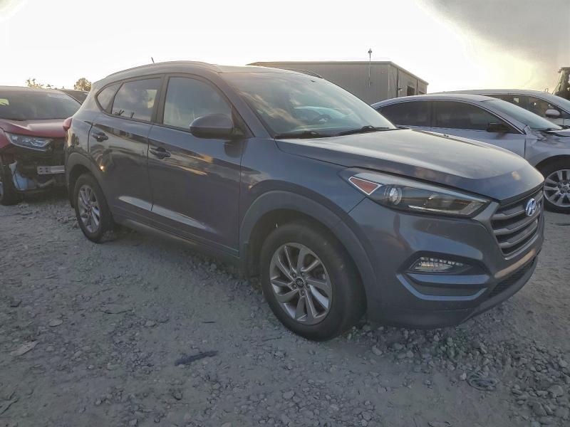 Photo 4 from auction – 2016 HYUNDAI TUCSON LIM with VIN KM8J33A43GU143618