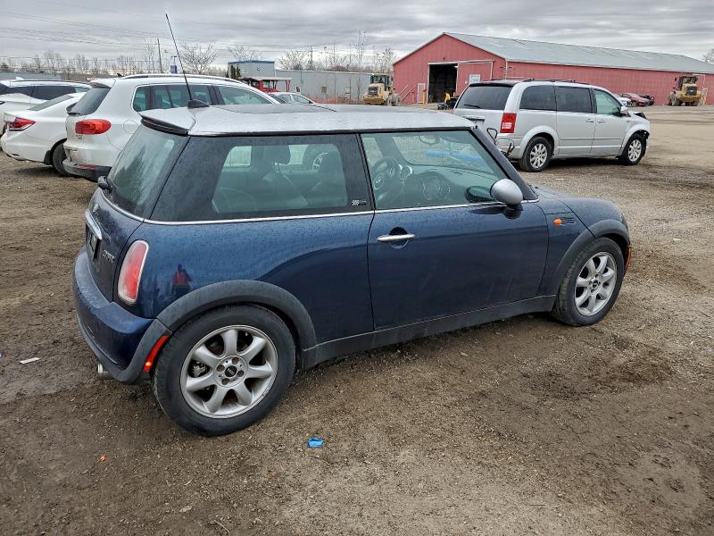 Photo 3 from auction – 2006 MINI COOPER with VIN WMWRC33516TK65019