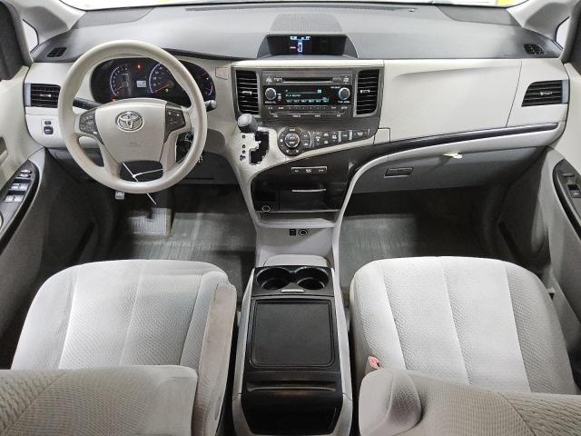 Photo 8 from auction – 2014 TOYOTA SIENNA LE with VIN 5TDKK3DC3ES484341