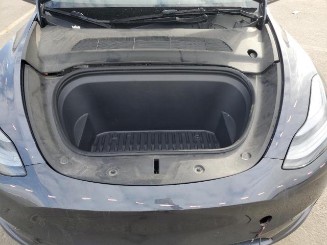 Photo 12 from auction – 2023 TESLA MODEL Y with VIN 7SAYGAEE3PF712185