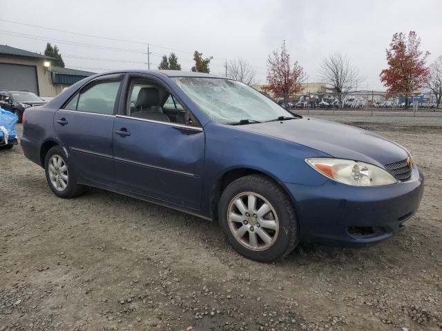 Photo 4 from auction – 2002 TOYOTA CAMRY LE with VIN JTDBE32K220134361