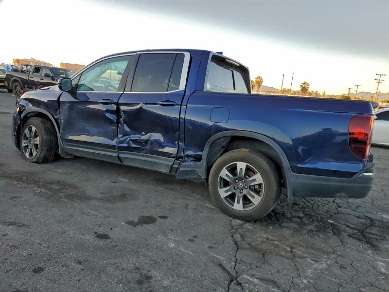 Photo 2 from auction – 2019 HONDA RIDGELINE with VIN 5FPYK3F61KB006752