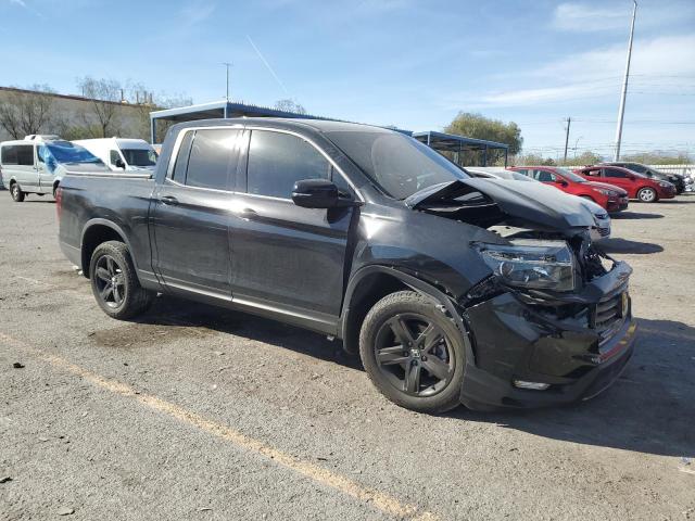 Photo 4 from auction – 2023 HONDA RIDGELINE with VIN 5FPYK3F85PB015737