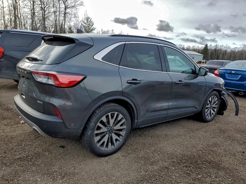 Photo 3 from auction – 2020 FORD ESCAPE TIT with VIN 1FMCU9DZ4LUA60788