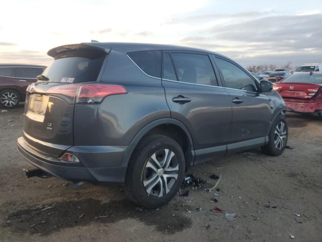 Photo 3 from auction – 2018 TOYOTA RAV4 LE with VIN JTMBFREV7JJ192111